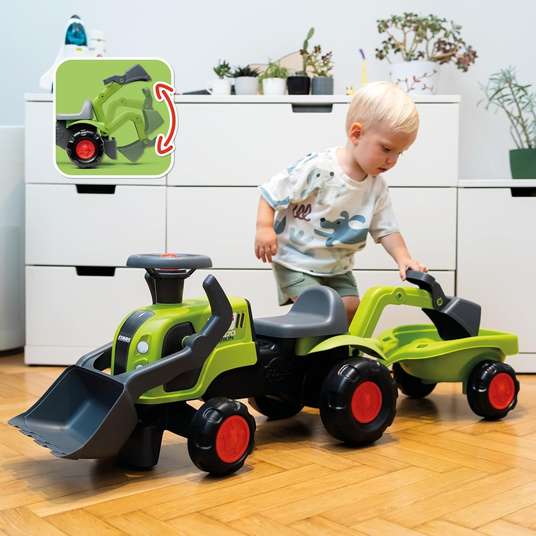 FALK Baby Claas-ajotraktori, jossa on kaivinkoneen kauha ja perävaunu.